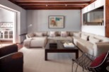 Spacious living area with an L-shaped sofa perfect for relaxation and entertaining.