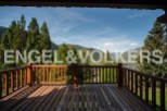 Mountain view from a wooden deck.