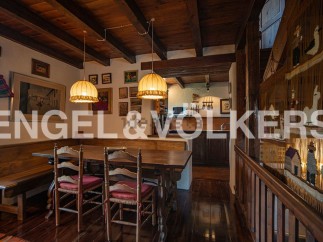 Rustic charm meets modern comfort in this unique property.