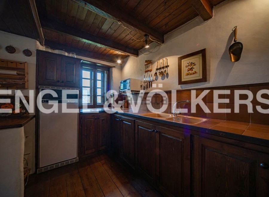 Rustic charm meets modern convenience in this charming kitchen.