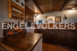 Rustic kitchen with wooden cabinets and countertops, offering a charming and cozy atmosphere.