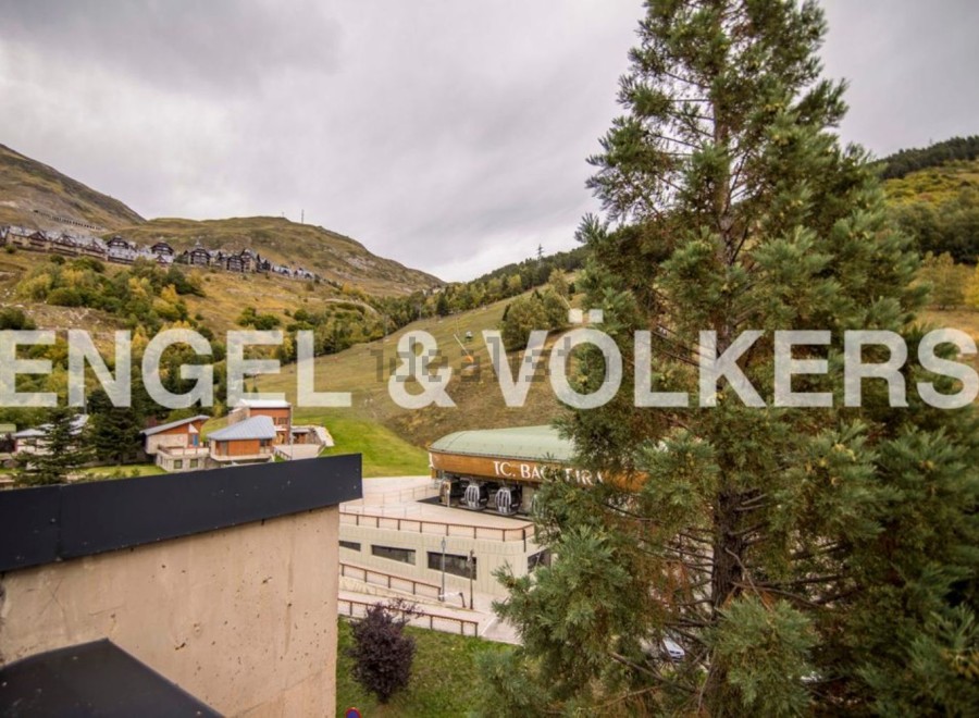 This stunning property boasts breathtaking mountain views and ski-in/ski-out access.