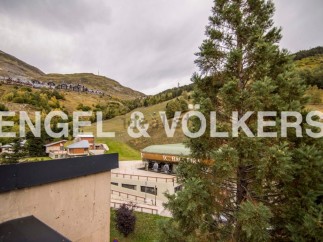 This stunning property boasts breathtaking mountain views and ski-in/ski-out access.
