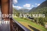 Mountain view chalet with spacious balcony.