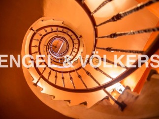 This stunning property boasts a unique spiral staircase, adding a touch of elegance and charm.