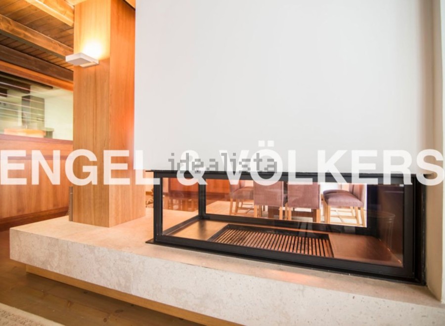 This stunning property boasts a modern, built-in fireplace, perfect for cozy nights in.