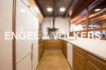 Stunning kitchen with modern appliances and wooden cabinetry.