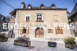 This charming stone house is located in a picturesque village setting.