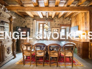 Rustic charm meets modern comfort in this stunning property.