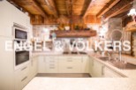 Rustic charm meets modern convenience in this stunning kitchen.