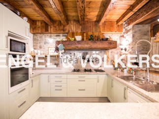 Rustic charm meets modern convenience in this stunning kitchen.