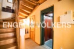 This stunning property boasts a beautiful wooden staircase and a convenient elevator, perfect for easy access to all levels.