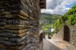 This stunning property boasts a unique stone exterior, perfectly complementing the picturesque mountain views.