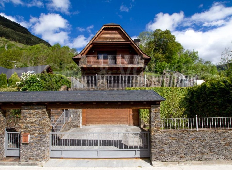Mountainside chalet with stunning views and private gated entrance.