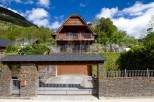 Mountainside chalet with stunning views and private gated entrance.