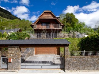 Mountainside chalet with stunning views and private gated entrance.