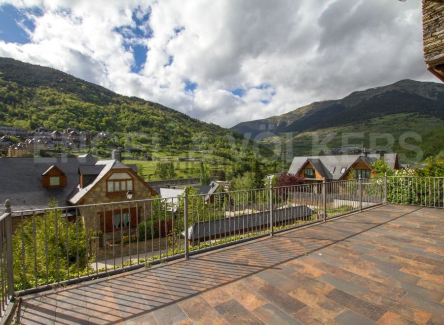 Mountain view luxury home with a spacious patio.