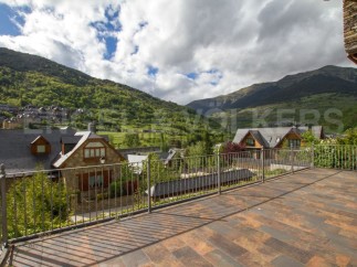 Mountain view luxury home with a spacious patio.