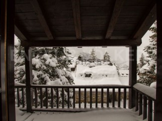 Wake up to breathtaking snowy views from your private balcony.