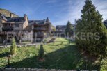 This stunning stone property boasts breathtaking mountain views and a prime location.