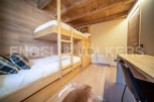 This stunning chalet boasts a charming bunk bed room, perfect for families or groups.