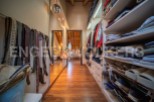 This stunning property boasts a spacious walk-in closet, complete with custom shelving and ample storage space for all your clothing and accessories.