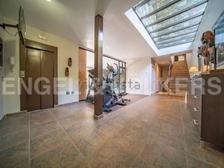 This stunning property boasts a private gym, complete with state-of-the-art equipment, perfect for maintaining a healthy lifestyle.