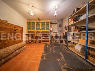 This unique property boasts a spacious, well-equipped basement perfect for storage and organization.