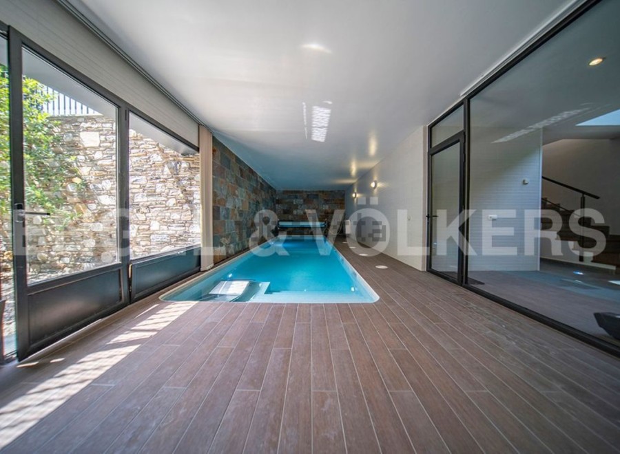 Indulge in luxury with this stunning indoor pool, seamlessly integrated into a modern architectural design.