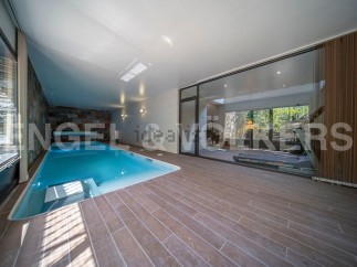This stunning property boasts a luxurious indoor swimming pool, perfect for year-round relaxation.