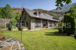 Mountain retreat with stunning views and a spacious garden.