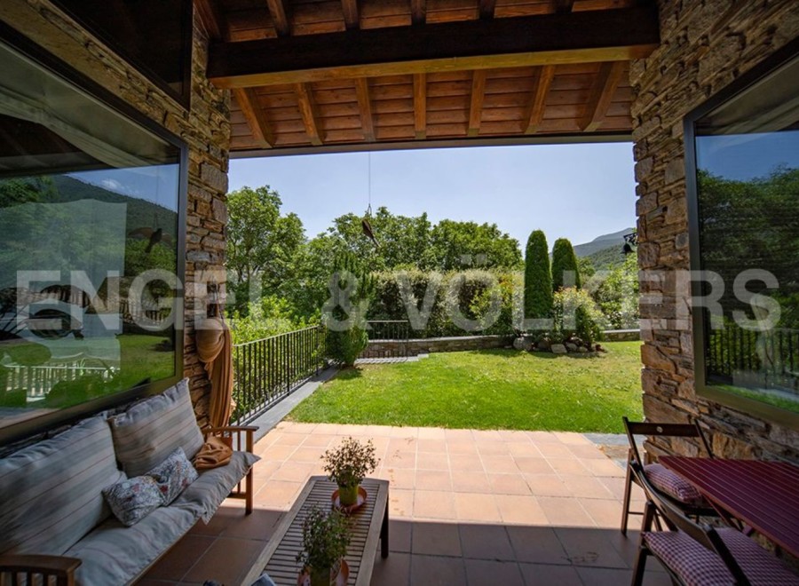 This stunning property boasts a spacious covered patio, perfect for outdoor relaxation and entertaining.