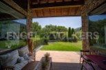 This stunning property boasts a spacious covered patio, perfect for outdoor relaxation and entertaining.