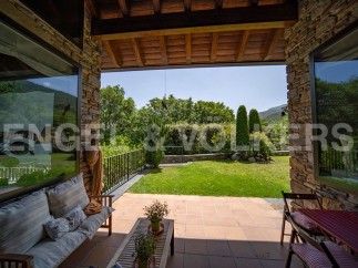 This stunning property boasts a spacious covered patio, perfect for outdoor relaxation and entertaining.