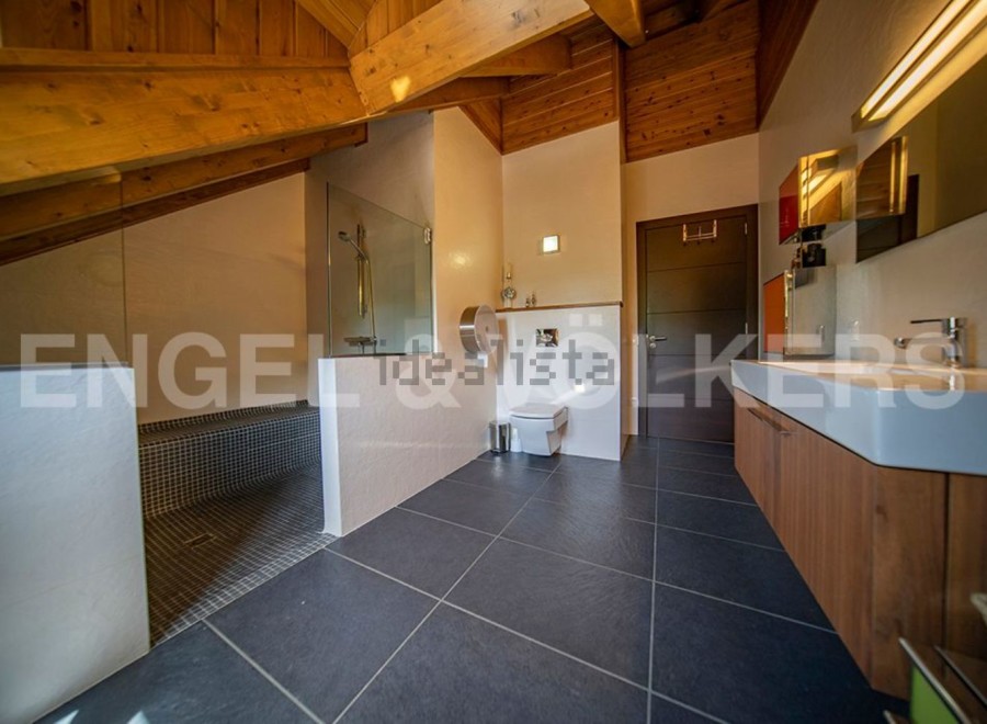 Luxurious bathroom with modern fixtures and finishes.
