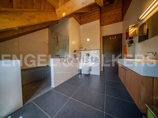 Luxurious bathroom with modern fixtures and finishes.