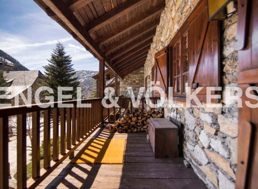 Mountain retreat with stunning views and rustic charm.