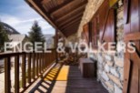 Mountain retreat with stunning views and rustic charm.