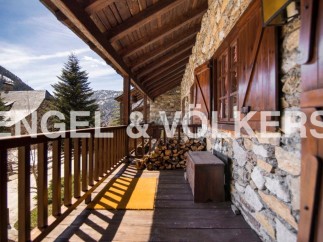 Mountain retreat with stunning views and rustic charm.