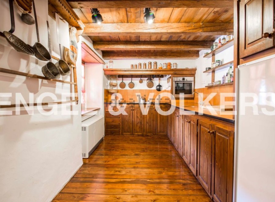 Rustic charm meets modern convenience in this unique kitchen.