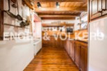 Rustic charm meets modern convenience in this unique kitchen.