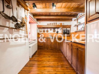 Rustic charm meets modern convenience in this unique kitchen.