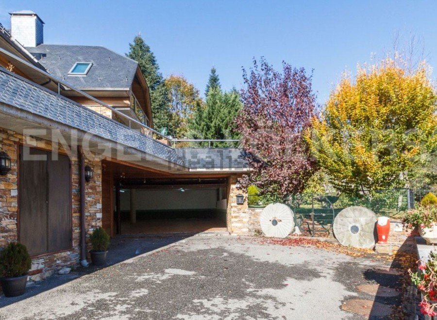 This stunning property boasts a spacious garage, perfect for housing multiple vehicles.