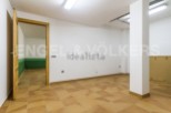 Spacious basement with tiled flooring and ample natural light.