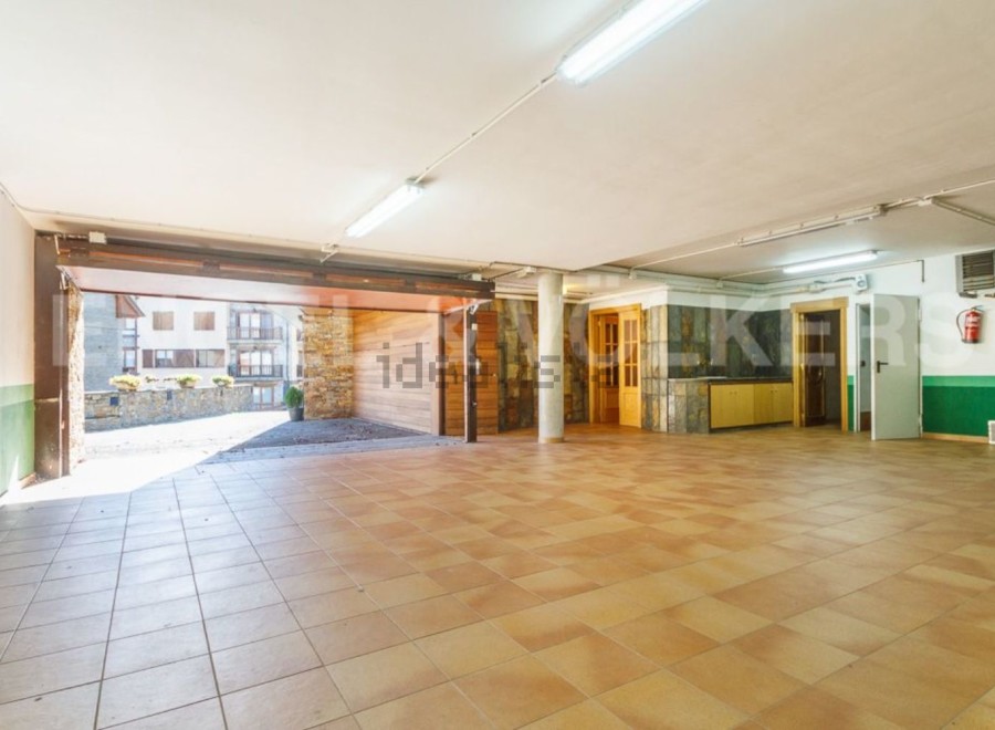 Spacious garage with ample room for multiple vehicles and storage.
