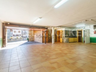 Spacious garage with ample room for multiple vehicles and storage.