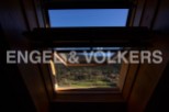 Wake up to breathtaking mountain views from this unique attic room.