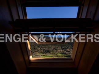 Wake up to breathtaking mountain views from this unique attic room.
