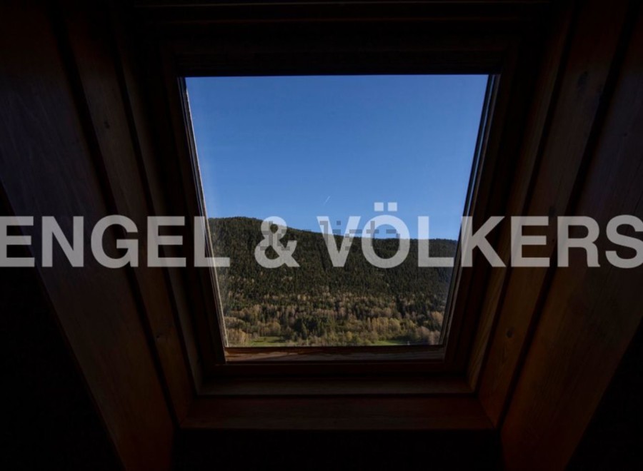 Wake up to breathtaking mountain views from this unique attic room.