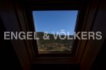 Wake up to breathtaking mountain views from this unique attic room.